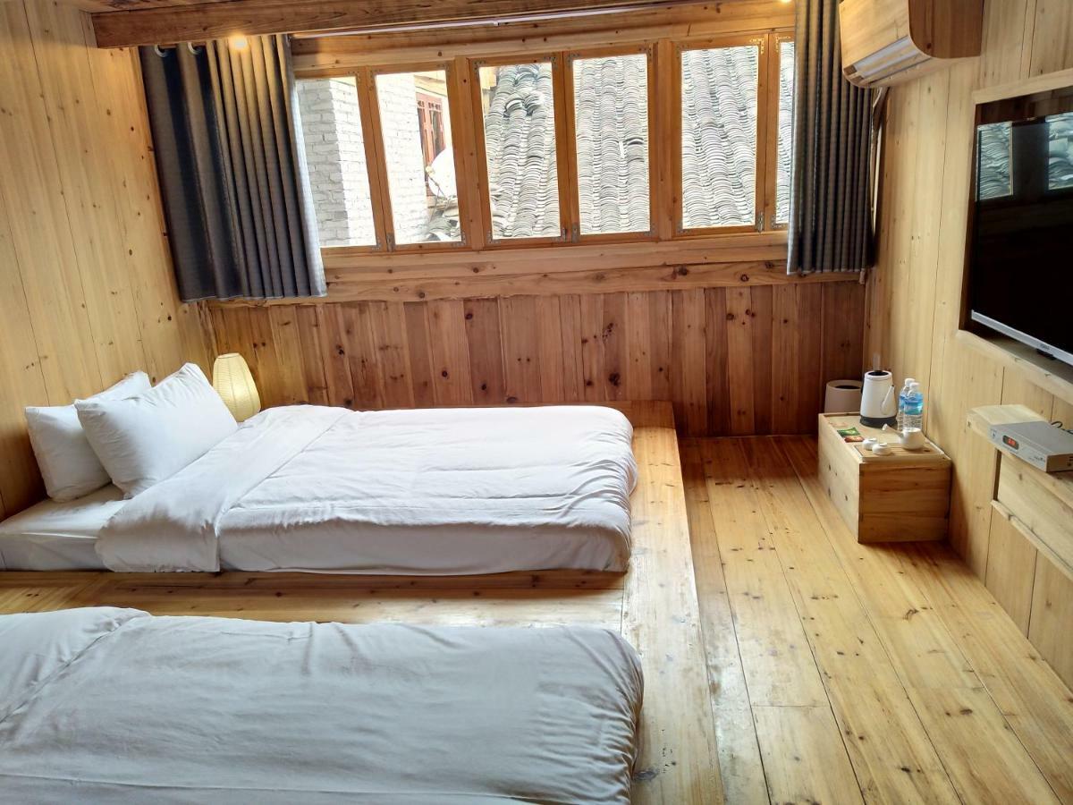Tong Sang Art Hotel Liping Exterior photo
